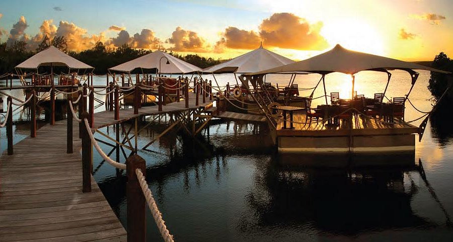 Le Barachois floating restaurant pontoons at sunset