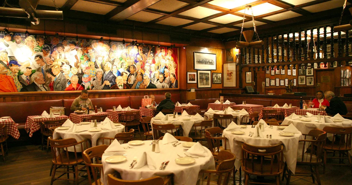 Gallagher's Steakhouse dining room lined with celebrity caricatures