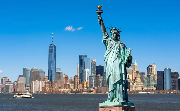 Statue of Liberty with the Manhattan skyline behind it