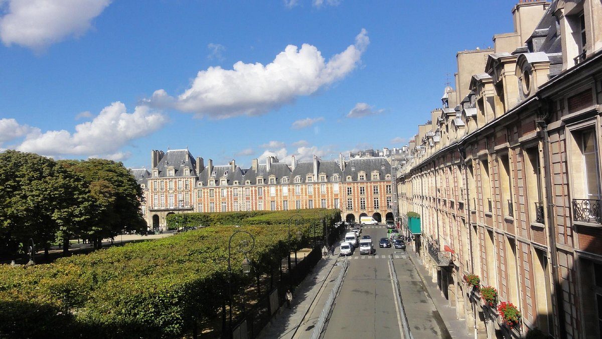A tree-lined street in Le Marais near Place des Vosges