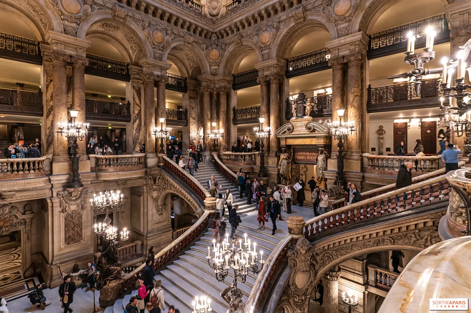 The grand marble staircase inside the Palais Garnier opera house