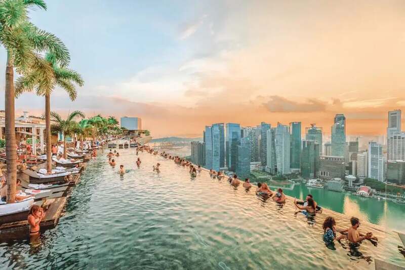 The rooftop infinity pool at Marina Bay Sands overlooking the Singapore skyline